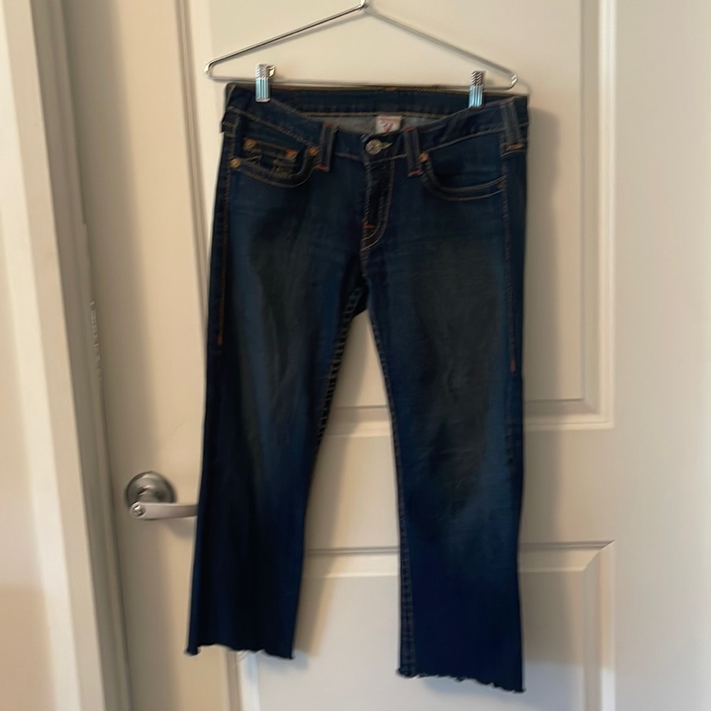 Low rise stretch true religion size 31, inseam 23 cropped jeans, frayed bottom